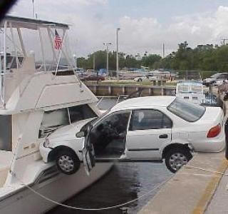 car crashes into boat